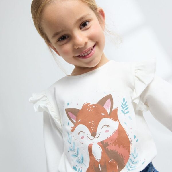 Camiseta manga larga volantes a tono en hombros y puños con elástico