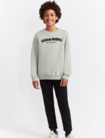 Conjunto de dos piezas, sudadera verde amazona y pantalón negro