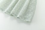 VESTIDO NIÑA TEJIDO PLUMETI ESTAMPADO, CON VOLANTE ACABADO EN U EN ESPALDA Y LAZADA EN BLANCO - Imagen 5