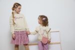 Conjunto sudadera afelpada con letras de cuerda glitter y falda de vuelo en tejido micropana. - Imagen 10