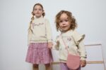 Conjunto sudadera afelpada con letras de cuerda glitter y falda de vuelo en tejido micropana. - Imagen 11