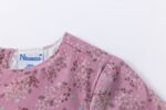 Vestido micropana con detalle de flores en las mangas, cierre atrasero con botones. - Imagen 6