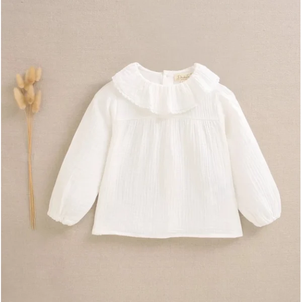 Blusa de bebé muselina blanca con volante en el cuello