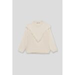 Jersey de punto, color crudo y flecos